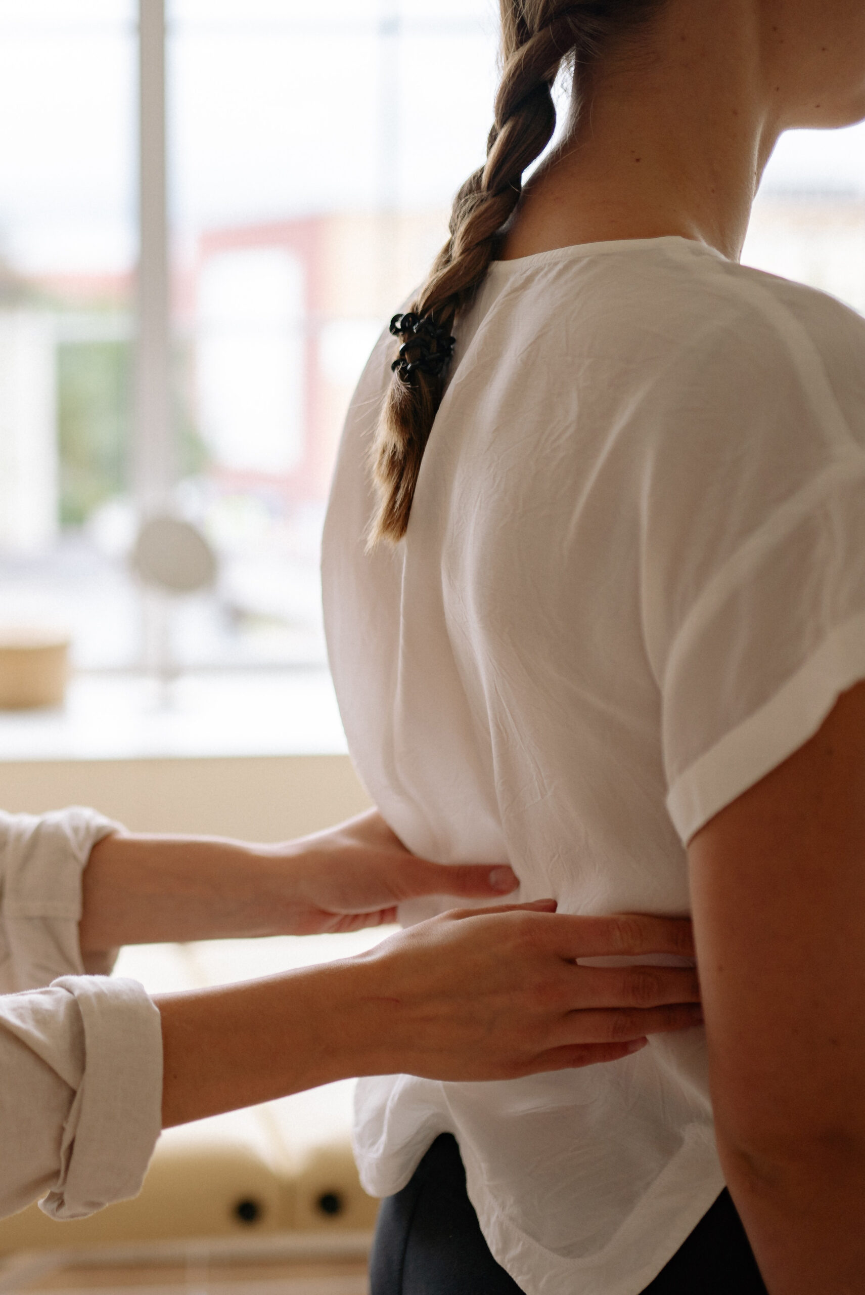 physical therapist working with patient